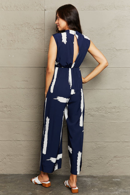Navy Blue Printed Round Neck Cutout Jumpsuit with Pockets