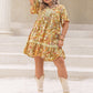 Plus Size Printed Tie Neck Short Sleeve Mini Dress