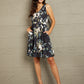 Double Take Printed Scoop Neck Sleeveless Buttoned Magic Dress with Pockets