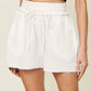 Double Take Full Size Texture Raw Trim Drawstring Shorts
