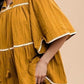 Annie Wear Tassel Contrast Trim Tie Neck Half Sleeve Tiered Dress
