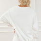 Exposed Seam High-Low Long Sleeve Sweatshirt