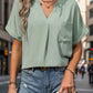 Pocketed Notched Short Sleeve Blouse