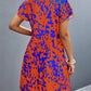 Ruffled Printed V-Neck Short Sleeve Mini Dress