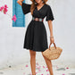 Black Surplice Flutter Sleeve Mini Dress