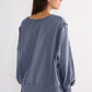 Exposed Seam High-Low Long Sleeve Sweatshirt