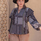 Plus Size Ruffled Printed Notched Long Sleeve Blouse