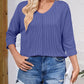 Full Size Textured Round Neck Three-Quarter Sleeve Blouse