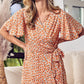 BiBi Floral Tied Tangerine Short Sleeve Mini Wrap Dress