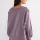 Exposed Seam High-Low Long Sleeve Sweatshirt