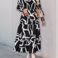 Perfee Smocked Printed Long Sleeve Midi Dress