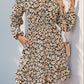 Perfee Printed Tie Neck Long Sleeve Mini Dress