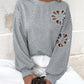 Perfee Cutout Pearl Round Neck Long Sleeve Sweatshirt