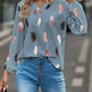 Feather Print Notched Balloon Sleeve Top