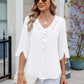 Ruffled V-Neck Three-Quarter Sleeve Blouse