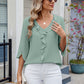 Ruffled V-Neck Three-Quarter Sleeve Blouse