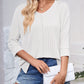 Full Size Textured Round Neck Three-Quarter Sleeve Blouse