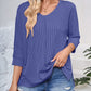 Full Size Textured Round Neck Three-Quarter Sleeve Blouse
