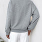 Perfee Cutout Pearl Round Neck Long Sleeve Sweatshirt