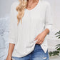 Full Size Textured Round Neck Three-Quarter Sleeve Blouse