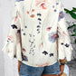 Ruffled Printed V-Neck Half Sleeve Blouse