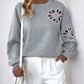 Perfee Cutout Pearl Round Neck Long Sleeve Sweatshirt