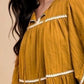 Annie Wear Tassel Contrast Trim Tie Neck Half Sleeve Tiered Dress
