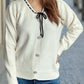 Tied V-Neck Long Sleeve Sweater
