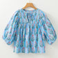 Smocked Floral Print Tie Neck Blouse
