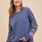 Annie Wear Embroidered Long Sleeve French Terry Top