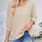 Full Size Textured Round Neck Three-Quarter Sleeve Blouse