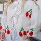 Tied Cherry Round Neck Long Sleeve Cardigan