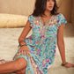 Ruffled Printed Tie Neck Cap Sleeve Dress