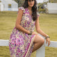 Ruffled Printed Tie Neck Cap Sleeve Dress