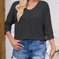 Full Size Textured Round Neck Three-Quarter Sleeve Blouse