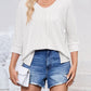 Full Size Textured Round Neck Three-Quarter Sleeve Blouse