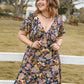 Plus Size Tied Printed Short Sleeve Midi Dress