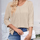 Full Size Textured Round Neck Three-Quarter Sleeve Blouse