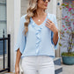 Ruffled V-Neck Three-Quarter Sleeve Blouse