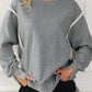 Exposed Seam High-Low Long Sleeve Sweatshirt