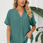 Full Size Side Slit Notched Neck Cuffed Short Sleeve Blouse