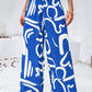 Smocked Printed Wide Leg Pants with Pockets