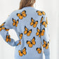 TrendiStyles Butterfly Pattern Round Neck Dropped Shoulder Sweater 🦋