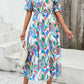 Larissa Bea Smocked Printed V-Neck Short Sleeve Dress