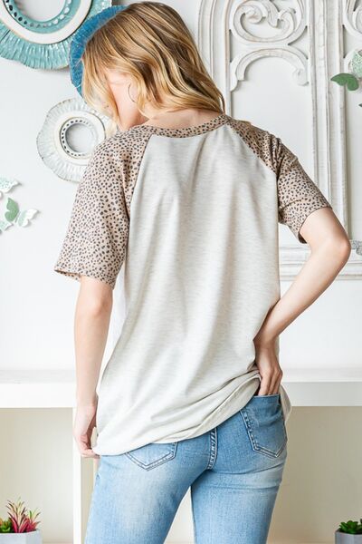Heimish Full Size Animal Print Half Button Short Sleeve Top *