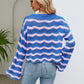 Round Neck Openwork Flare Sleeve Knit Top
