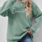 FOLLOW YOUR DREAMS Graphic Sweatshirt