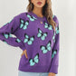 TrendiStyles Butterfly Pattern Round Neck Dropped Shoulder Sweater 🦋