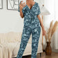 DuskJumpers Surplice Neck Tied Short Sleeve Jumpsuit
