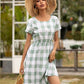Smocked Plaid Round Neck Short Sleeve Dress